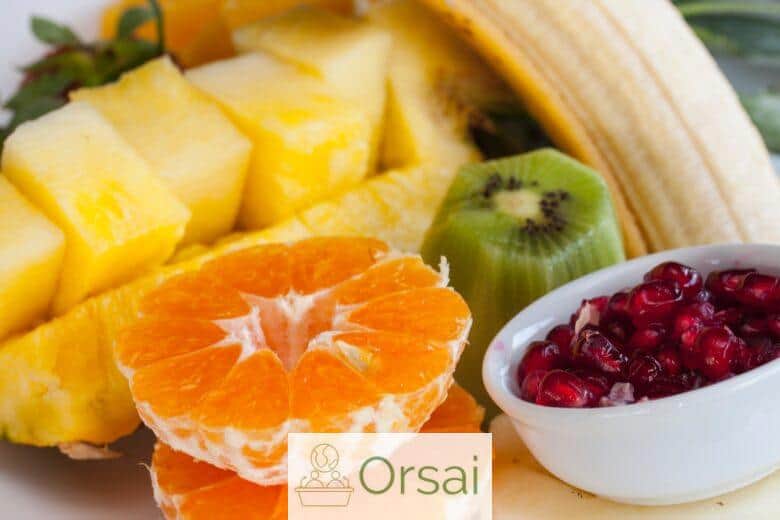 sliced orange fruit on white ceramic bowl